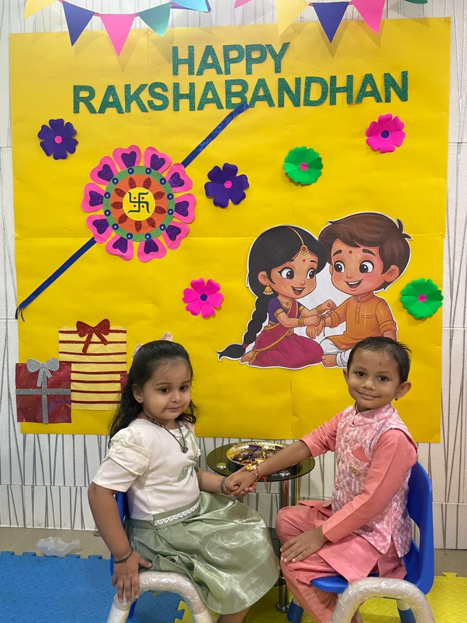 Two children celebrating Raksha Bandhan